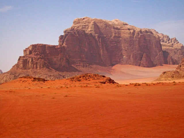 the bright red wadi rum desert in jordan often doubles as mars in movies like in the recent blockbus